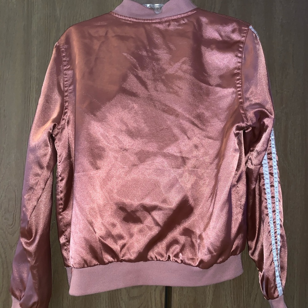 Rose gold jacket.